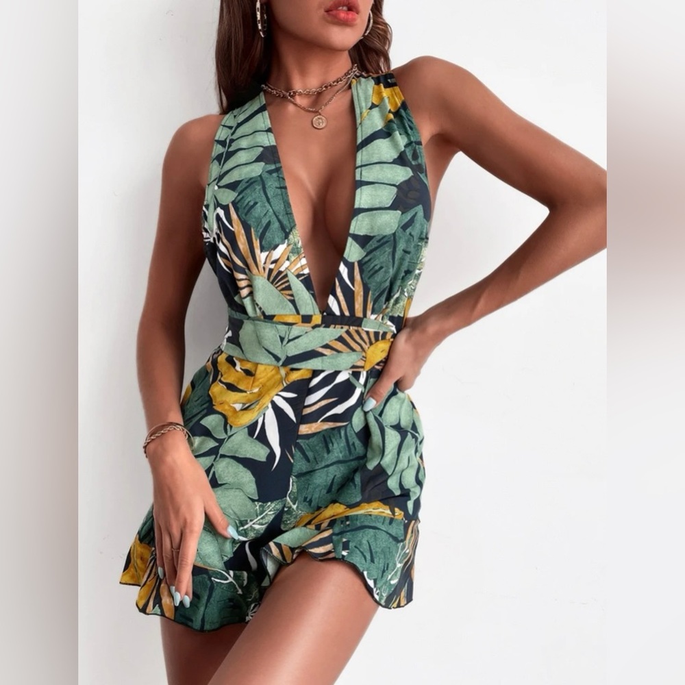 New without tags never worn leaf print ruffle trim tie back romper